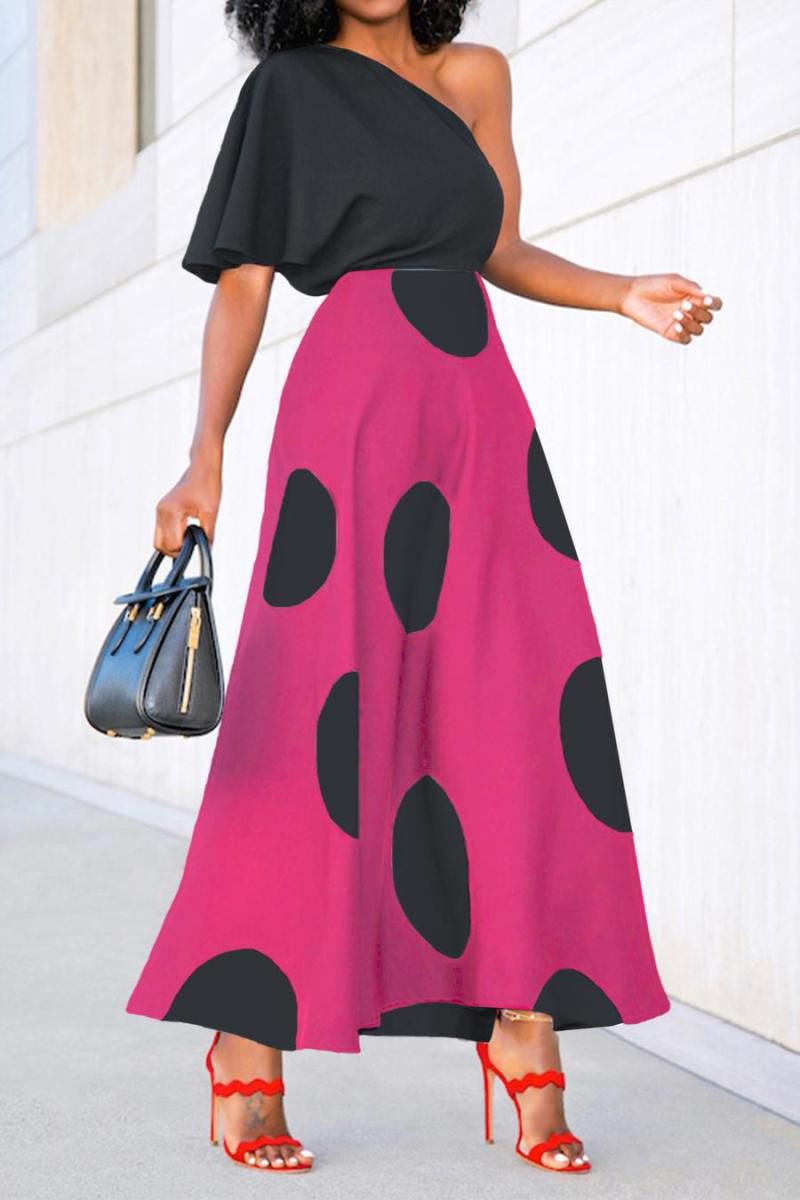 Traje fushia y negro